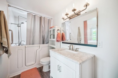Set in a private, tree-lined location with a tranquil pond out on Golf at the Legacy in Minnesota - for sale on GolfHomes.com, golf home, golf lot