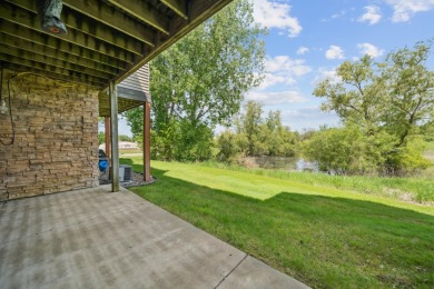 Set in a private, tree-lined location with a tranquil pond out on Golf at the Legacy in Minnesota - for sale on GolfHomes.com, golf home, golf lot
