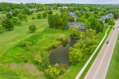 Set in a private, tree-lined location with a tranquil pond out on Golf at the Legacy in Minnesota - for sale on GolfHomes.com, golf home, golf lot