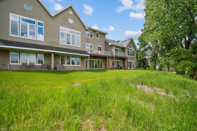 Set in a private, tree-lined location with a tranquil pond out on Golf at the Legacy in Minnesota - for sale on GolfHomes.com, golf home, golf lot