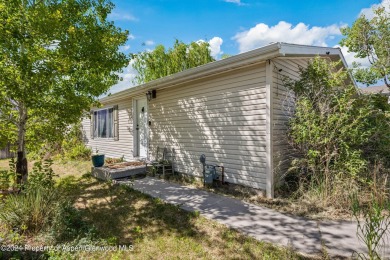 Your new 3 bed/ 2 bathroom home awaits in lovely Parachute CO on Battlement Mesa Golf Course in Colorado - for sale on GolfHomes.com, golf home, golf lot