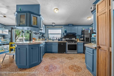 Your new 3 bed/ 2 bathroom home awaits in lovely Parachute CO on Battlement Mesa Golf Course in Colorado - for sale on GolfHomes.com, golf home, golf lot