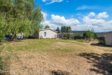 Your new 3 bed/ 2 bathroom home awaits in lovely Parachute CO on Battlement Mesa Golf Course in Colorado - for sale on GolfHomes.com, golf home, golf lot