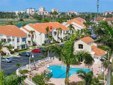 Golf Course Views in Isla Del Sol - Island Living at Its Finest! on Isla Del Sol Yacht and Country Club in Florida - for sale on GolfHomes.com, golf home, golf lot