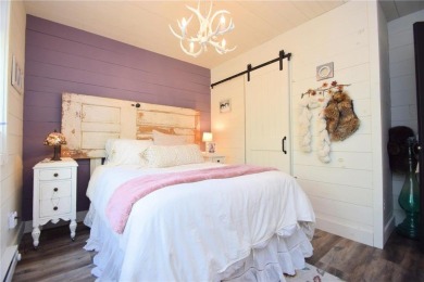 Not your average cottage! This 2023 built Timberland Cottage has on Voyager Village Country Club - Voyager in Wisconsin - for sale on GolfHomes.com, golf home, golf lot
