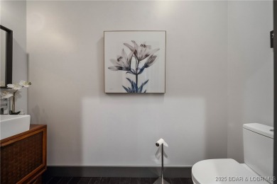 The views from this modernly constructed lakefront home are on Seasons Ridge At Four Seasons in Missouri - for sale on GolfHomes.com, golf home, golf lot