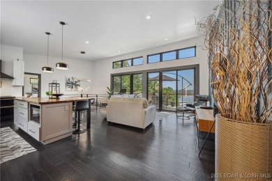 The views from this modernly constructed lakefront home are on Seasons Ridge At Four Seasons in Missouri - for sale on GolfHomes.com, golf home, golf lot