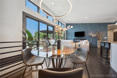 The views from this modernly constructed lakefront home are on Seasons Ridge At Four Seasons in Missouri - for sale on GolfHomes.com, golf home, golf lot