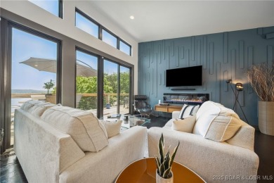 The views from this modernly constructed lakefront home are on Seasons Ridge At Four Seasons in Missouri - for sale on GolfHomes.com, golf home, golf lot