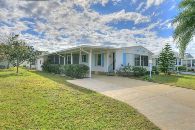 COME HOME TO BAREFOOT BAY....2 bedrooms, 2 bath beautiful home on Barefoot Bay Golf Course in Florida - for sale on GolfHomes.com, golf home, golf lot