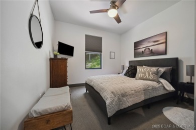 The views from this modernly constructed lakefront home are on Seasons Ridge At Four Seasons in Missouri - for sale on GolfHomes.com, golf home, golf lot