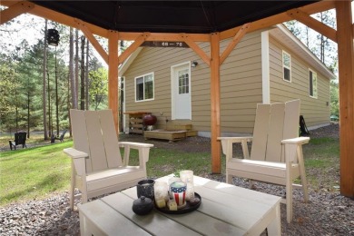 Not your average cottage! This 2023 built Timberland Cottage has on Voyager Village Country Club - Voyager in Wisconsin - for sale on GolfHomes.com, golf home, golf lot