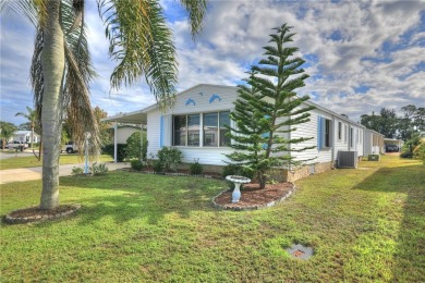 COME HOME TO BAREFOOT BAY....2 bedrooms, 2 bath beautiful home on Barefoot Bay Golf Course in Florida - for sale on GolfHomes.com, golf home, golf lot