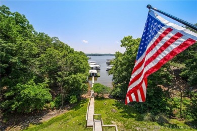 The views from this modernly constructed lakefront home are on Seasons Ridge At Four Seasons in Missouri - for sale on GolfHomes.com, golf home, golf lot