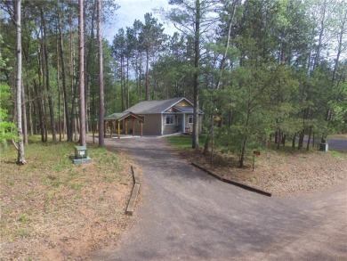 Not your average cottage! This 2023 built Timberland Cottage has on Voyager Village Country Club - Voyager in Wisconsin - for sale on GolfHomes.com, golf home, golf lot