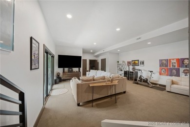 The views from this modernly constructed lakefront home are on Seasons Ridge At Four Seasons in Missouri - for sale on GolfHomes.com, golf home, golf lot