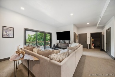 The views from this modernly constructed lakefront home are on Seasons Ridge At Four Seasons in Missouri - for sale on GolfHomes.com, golf home, golf lot