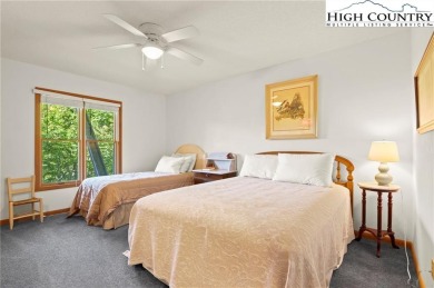 Located on paved St Andrews Road just across from the Beech on Beech Mountain Club in North Carolina - for sale on GolfHomes.com, golf home, golf lot