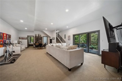 The views from this modernly constructed lakefront home are on Seasons Ridge At Four Seasons in Missouri - for sale on GolfHomes.com, golf home, golf lot