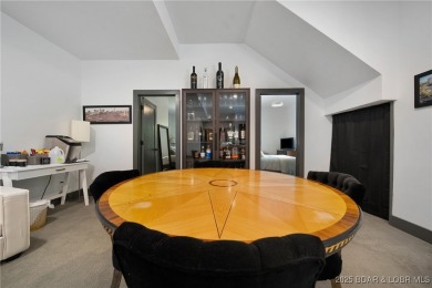 The views from this modernly constructed lakefront home are on Seasons Ridge At Four Seasons in Missouri - for sale on GolfHomes.com, golf home, golf lot