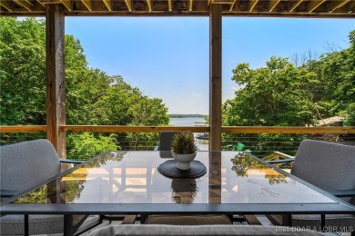 The views from this modernly constructed lakefront home are on Seasons Ridge At Four Seasons in Missouri - for sale on GolfHomes.com, golf home, golf lot