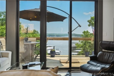 The views from this modernly constructed lakefront home are on Seasons Ridge At Four Seasons in Missouri - for sale on GolfHomes.com, golf home, golf lot
