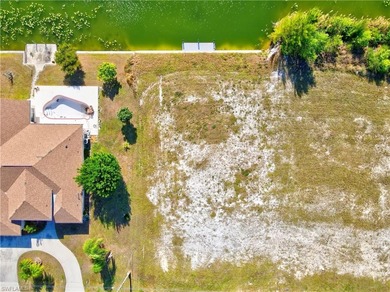 Prime freshwater canal lot located in the desirable Southwest on Palmetto-Pine Country Club in Florida - for sale on GolfHomes.com, golf home, golf lot