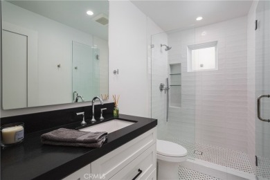 Set on a quiet street in the heart of Corona del Mar's Village on The Newport Beach Country Club in California - for sale on GolfHomes.com, golf home, golf lot