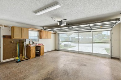 Beautiful 2-bedroom, 2-bath home located on a golf course in a on Highland Fairways Golf Club in Florida - for sale on GolfHomes.com, golf home, golf lot
