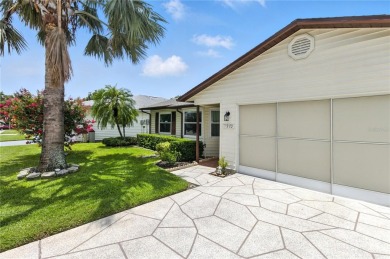 Beautiful 2-bedroom, 2-bath home located on a golf course in a on Highland Fairways Golf Club in Florida - for sale on GolfHomes.com, golf home, golf lot