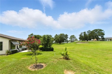 Beautiful 2-bedroom, 2-bath home located on a golf course in a on Highland Fairways Golf Club in Florida - for sale on GolfHomes.com, golf home, golf lot