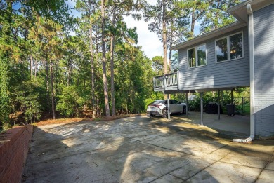 Charming southern cottage tucked away in the trees! You will on The Aiken Golf Club in South Carolina - for sale on GolfHomes.com, golf home, golf lot