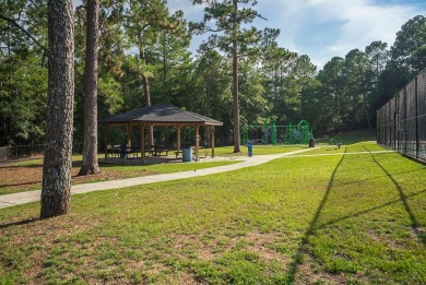 Charming southern cottage tucked away in the trees! You will on The Aiken Golf Club in South Carolina - for sale on GolfHomes.com, golf home, golf lot