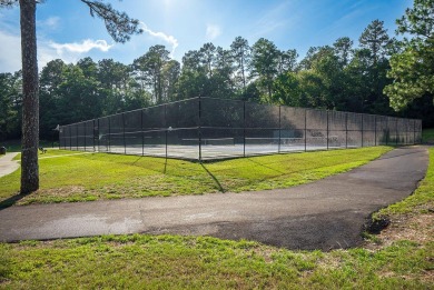 Charming southern cottage tucked away in the trees! You will on The Aiken Golf Club in South Carolina - for sale on GolfHomes.com, golf home, golf lot