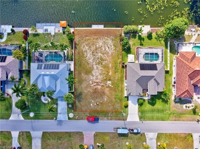 Build your dream home on this .26-acre waterfront homesite on El Rio Golf Course and Club in Florida - for sale on GolfHomes.com, golf home, golf lot