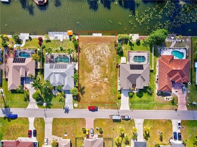 Build your dream home on this .26-acre waterfront homesite on El Rio Golf Course and Club in Florida - for sale on GolfHomes.com, golf home, golf lot