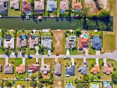 Build your dream home on this .26-acre waterfront homesite on El Rio Golf Course and Club in Florida - for sale on GolfHomes.com, golf home, golf lot