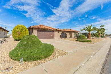 Charming single-story home in Sun City is now on the market! on Sun City Lakes West and East in Arizona - for sale on GolfHomes.com, golf home, golf lot