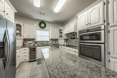 Luxury living meets breathtaking golf course views in this on Greystone Country Club in Arkansas - for sale on GolfHomes.com, golf home, golf lot