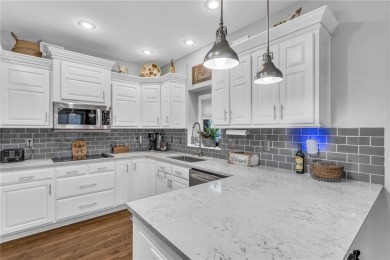 Nestled on a peaceful cul-de-sac, this delightful home is on Paola Country Club in Kansas - for sale on GolfHomes.com, golf home, golf lot