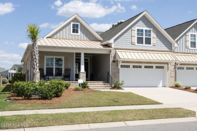 Welcome to this 4 bedroom, 3 full bath Plum Island II townhome on Compass Pointe Golf Course in North Carolina - for sale on GolfHomes.com, golf home, golf lot