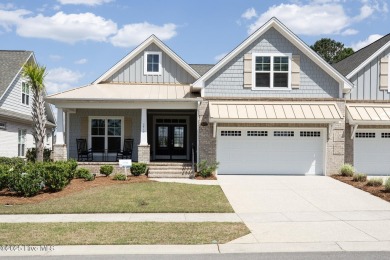 Welcome to this 4 bedroom, 3 full bath Plum Island II townhome on Compass Pointe Golf Course in North Carolina - for sale on GolfHomes.com, golf home, golf lot