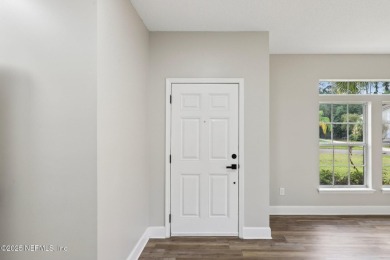Welcome to this inviting home in Chatham Village at Fleming on Golf Club At Fleming Island in Florida - for sale on GolfHomes.com, golf home, golf lot