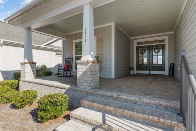 Welcome to this 4 bedroom, 3 full bath Plum Island II townhome on Compass Pointe Golf Course in North Carolina - for sale on GolfHomes.com, golf home, golf lot
