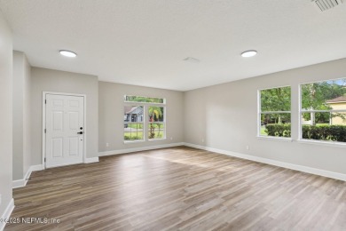 Welcome to this inviting home in Chatham Village at Fleming on Golf Club At Fleming Island in Florida - for sale on GolfHomes.com, golf home, golf lot