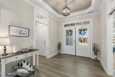 Welcome to this 4 bedroom, 3 full bath Plum Island II townhome on Compass Pointe Golf Course in North Carolina - for sale on GolfHomes.com, golf home, golf lot