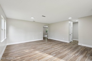 Welcome to this inviting home in Chatham Village at Fleming on Golf Club At Fleming Island in Florida - for sale on GolfHomes.com, golf home, golf lot