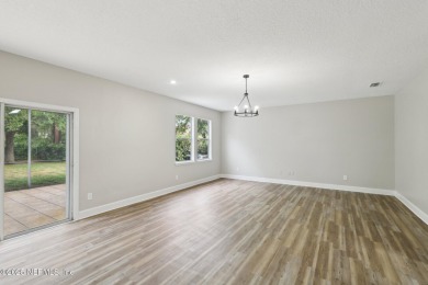 Welcome to this inviting home in Chatham Village at Fleming on Golf Club At Fleming Island in Florida - for sale on GolfHomes.com, golf home, golf lot