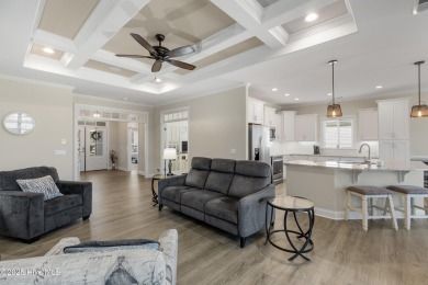 Welcome to this 4 bedroom, 3 full bath Plum Island II townhome on Compass Pointe Golf Course in North Carolina - for sale on GolfHomes.com, golf home, golf lot