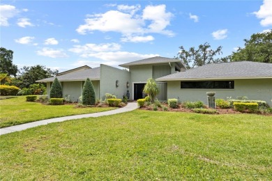 Architectural Gem in Sought-After Phase 1 of Carrollwood Village on Emerald Greens Golf Resort and Country Club in Florida - for sale on GolfHomes.com, golf home, golf lot